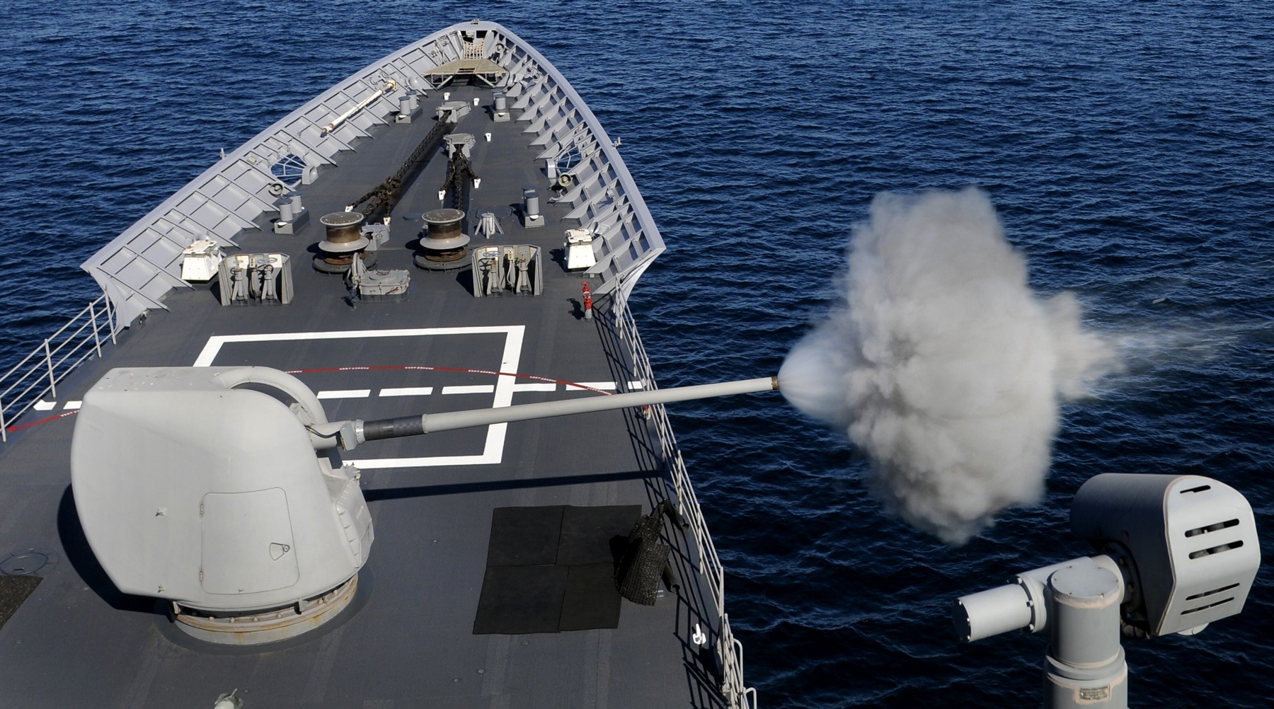 cg-52 uss bunker hill ticonderoga class guided missile cruiser aegis us navy mk.45 gun fire 77