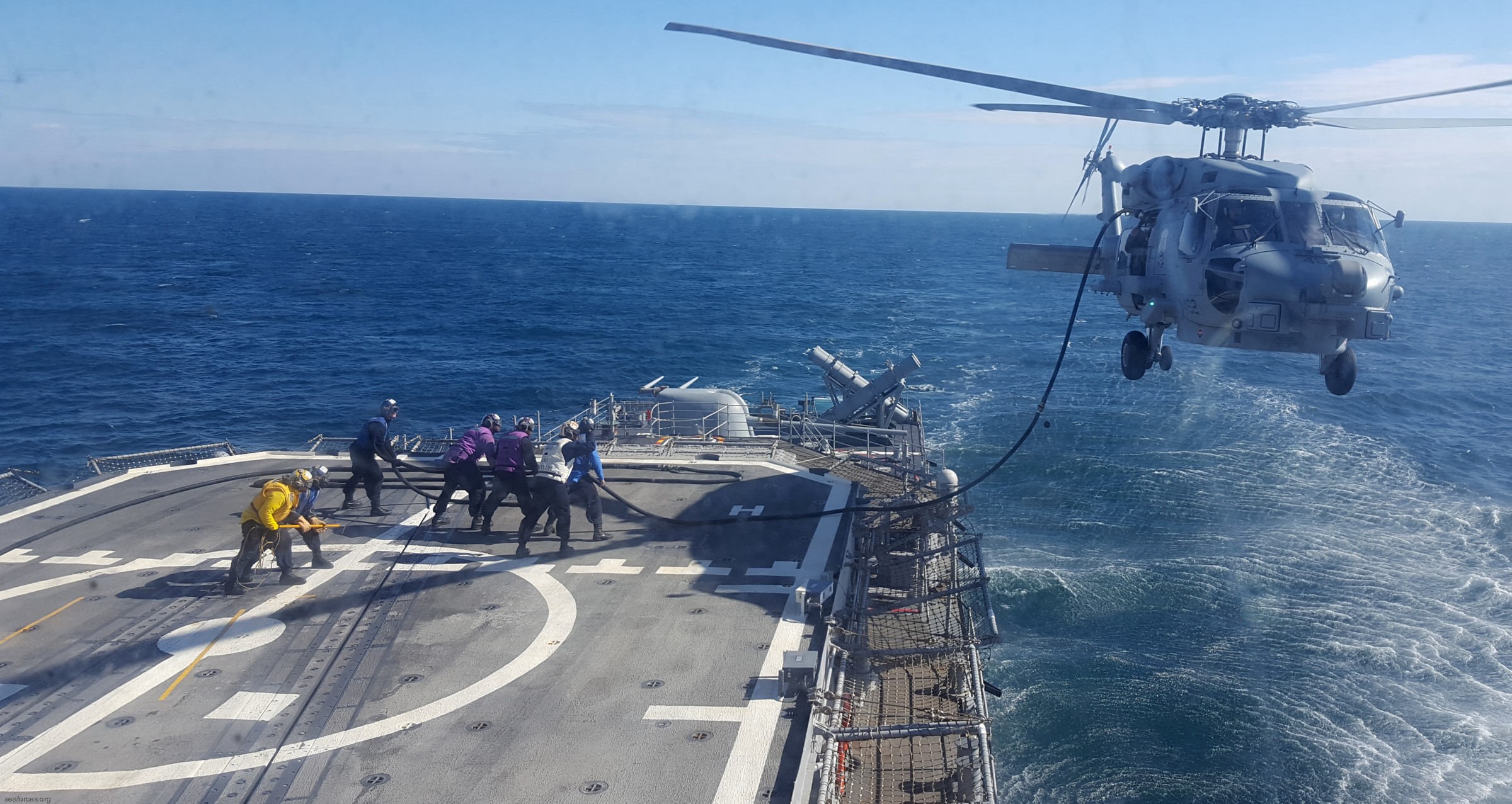 cg-72 uss vella gulf ticonderoga class guided missile cruiser navy 11 helicopter refueling