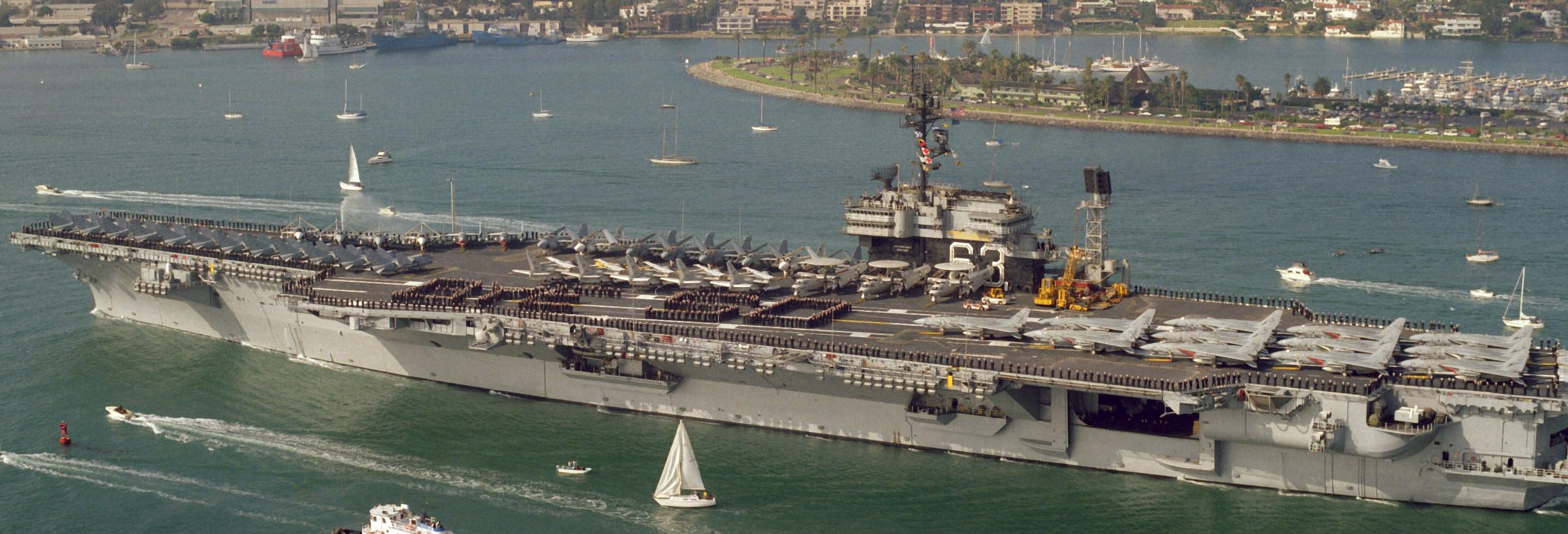 cv-63 uss kitty hawk aircraft carrier air wing cvw-9 us navy 436 departing san diego world cruise norfolk